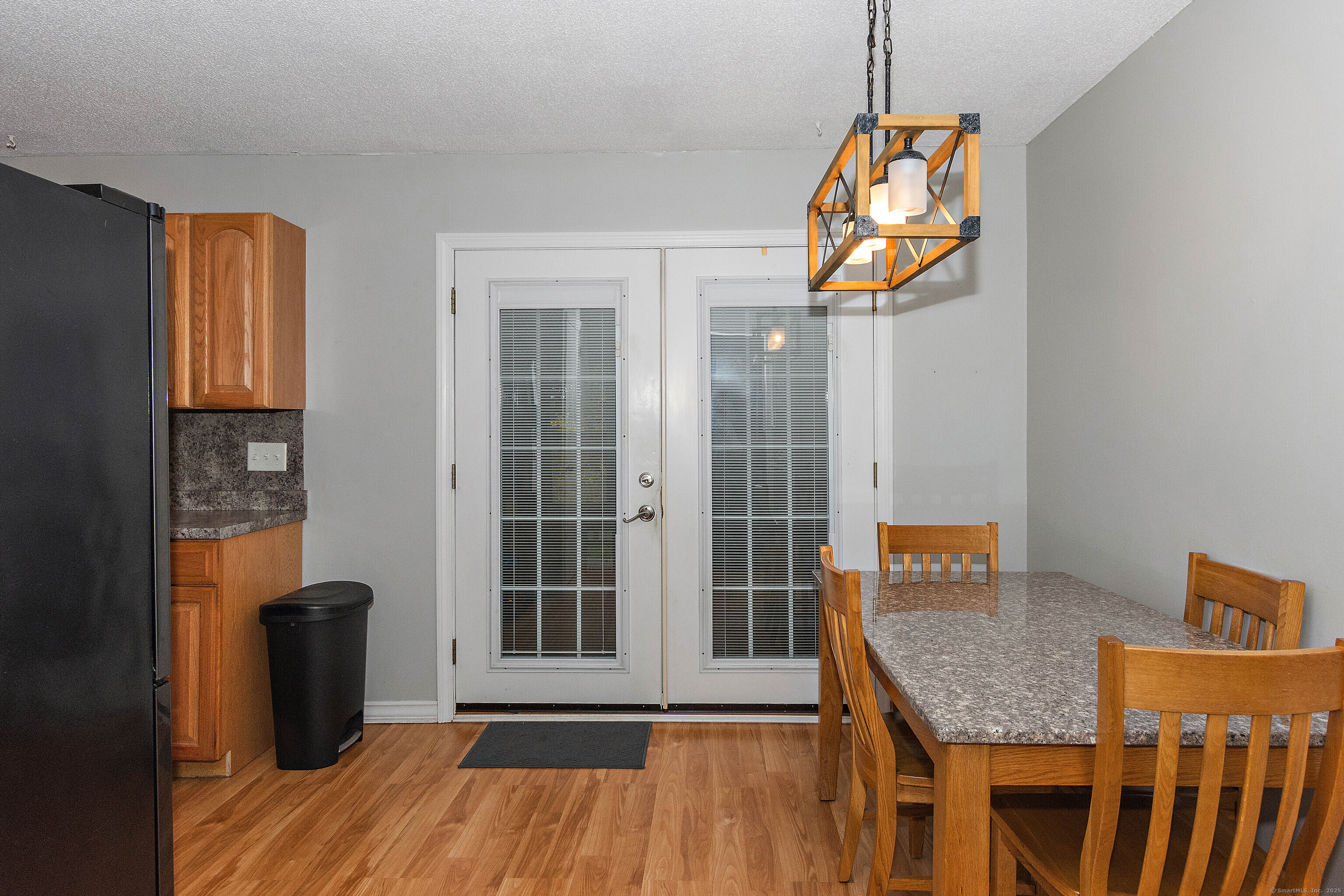 28 Juniper Lane Griswold, CT 06351 - Photo 13 of 15 a view of a livingroom with furniture and wooden floor