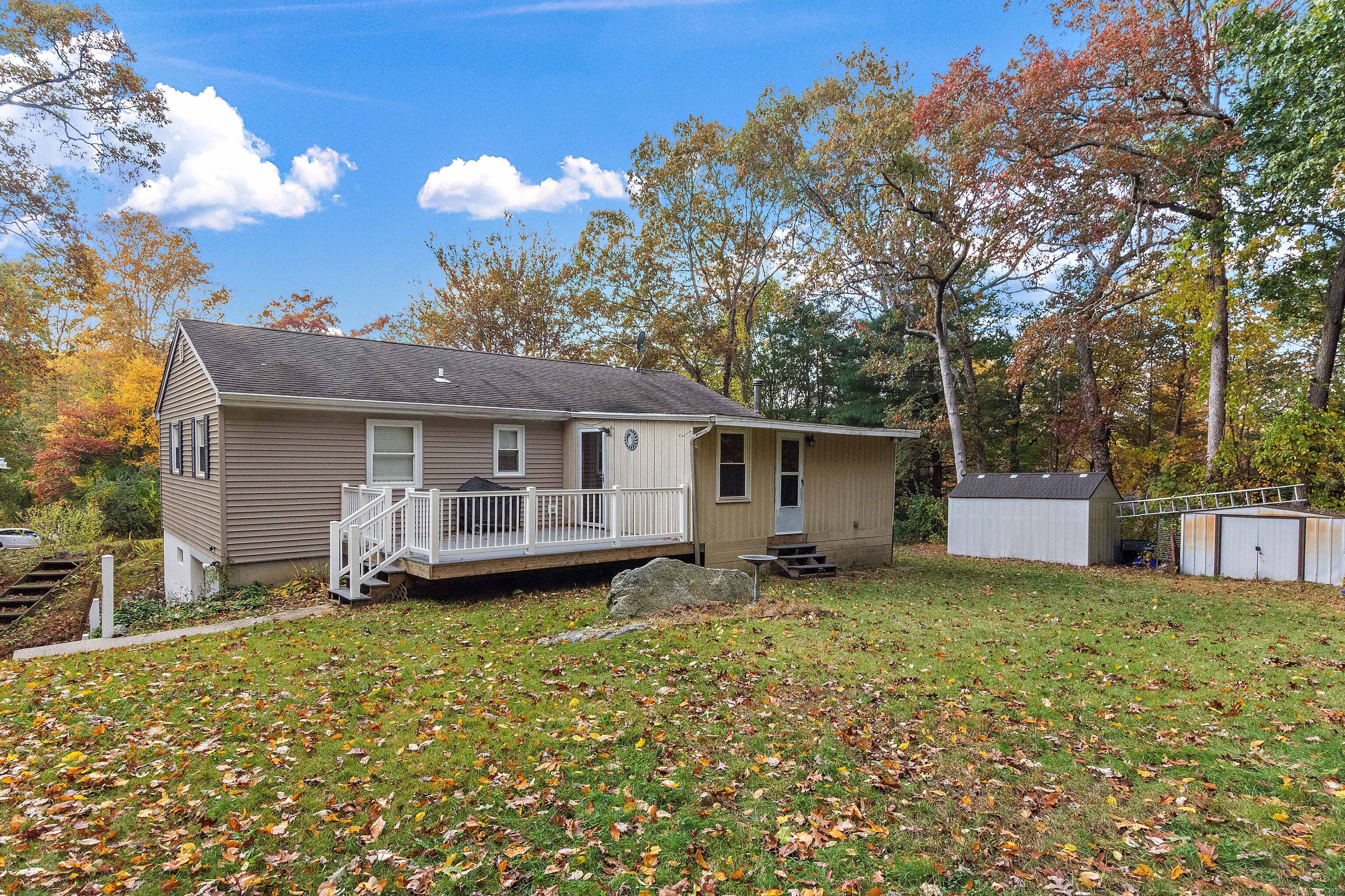 28 Juniper Lane Griswold, CT 06351 - Photo 3 of 15 a view of a house with a yard