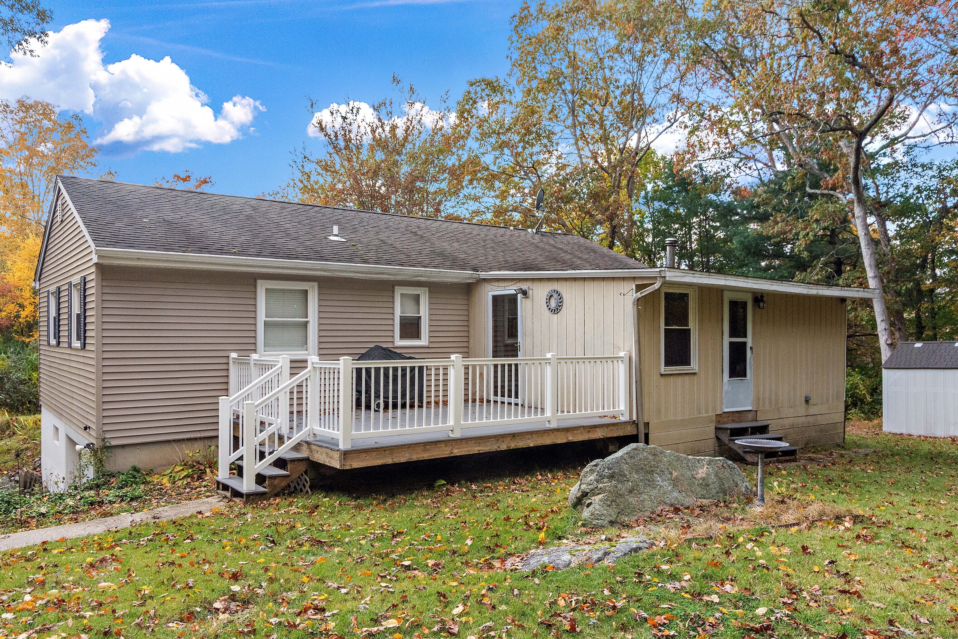 28 Juniper Lane Griswold, CT 06351 - Photo 4 of 15 a view of a house with a yard