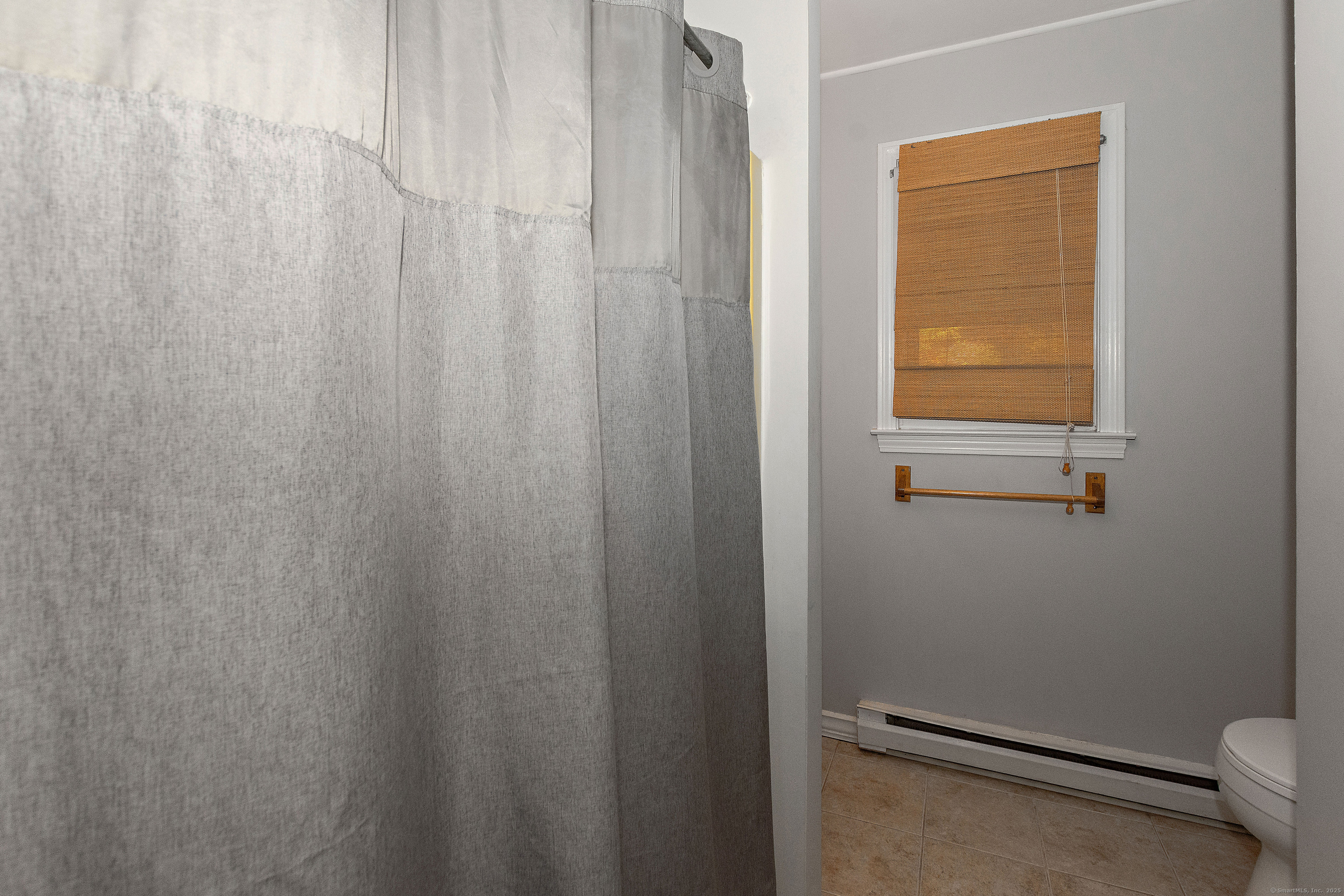 28 Juniper Lane Griswold, CT 06351 - Photo 9 of 15 a bathroom with a shower curtain