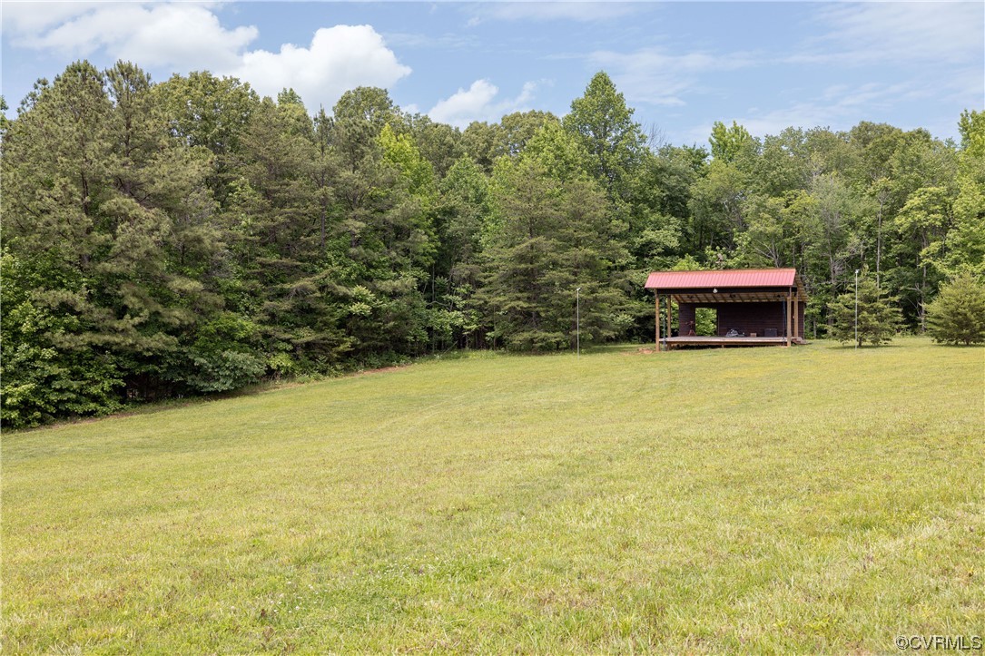5497 Old Columbia Road Goochland, VA 23063 - Photo 18 of 41 a view of a lake with a house in the background