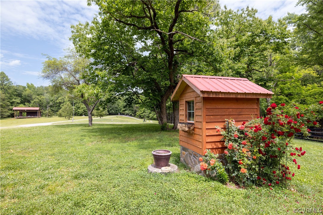 5497 Old Columbia Road Goochland, VA 23063 - Photo 19 of 41 a view of a house with a yard