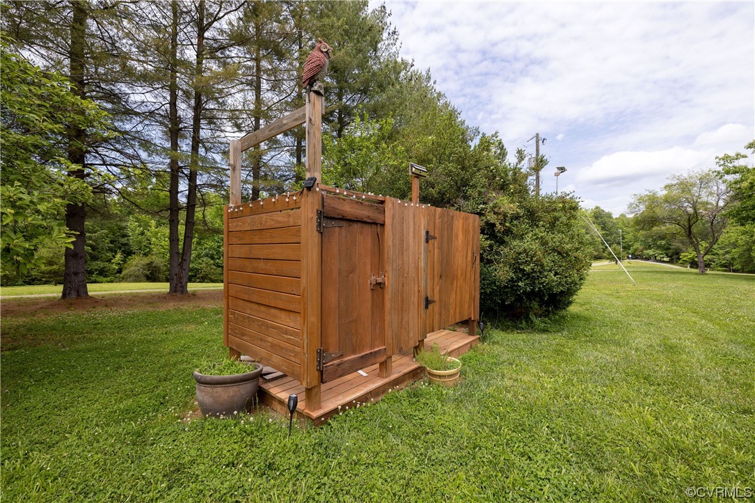 5497 Old Columbia Road Goochland, VA 23063 - Photo 20 of 41 a backyard of a house with lots of green space