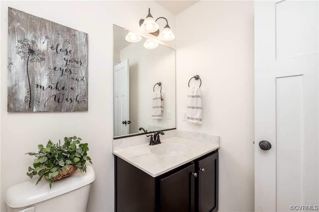 5497 Old Columbia Road Goochland, VA 23063 - Photo 26 of 41 a bathroom with a sink and a mirror