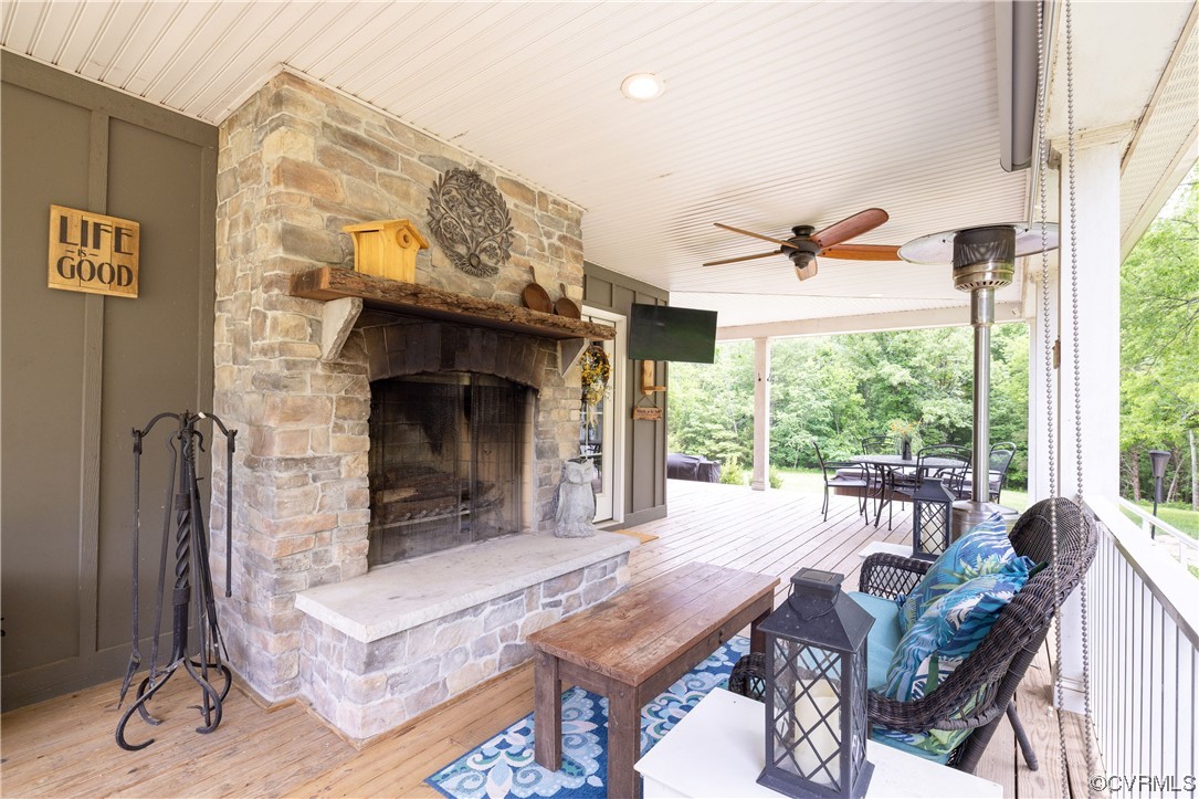 5497 Old Columbia Road Goochland, VA 23063 - Photo 28 of 41 a living room with furniture and a fireplace