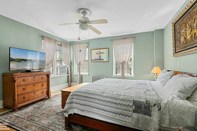 a room with gym equipment and a large window