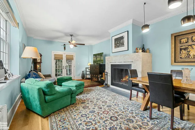 a kitchen with kitchen island a sink stove and refrigerator