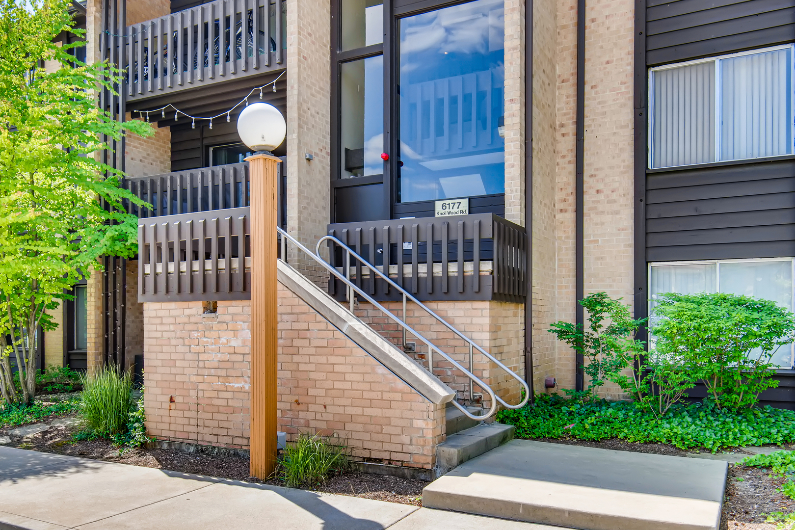 6177 Knoll Wood Road, Unit 201 Willowbrook, IL 60527 - Photo 2 of 11 a view of front door of house