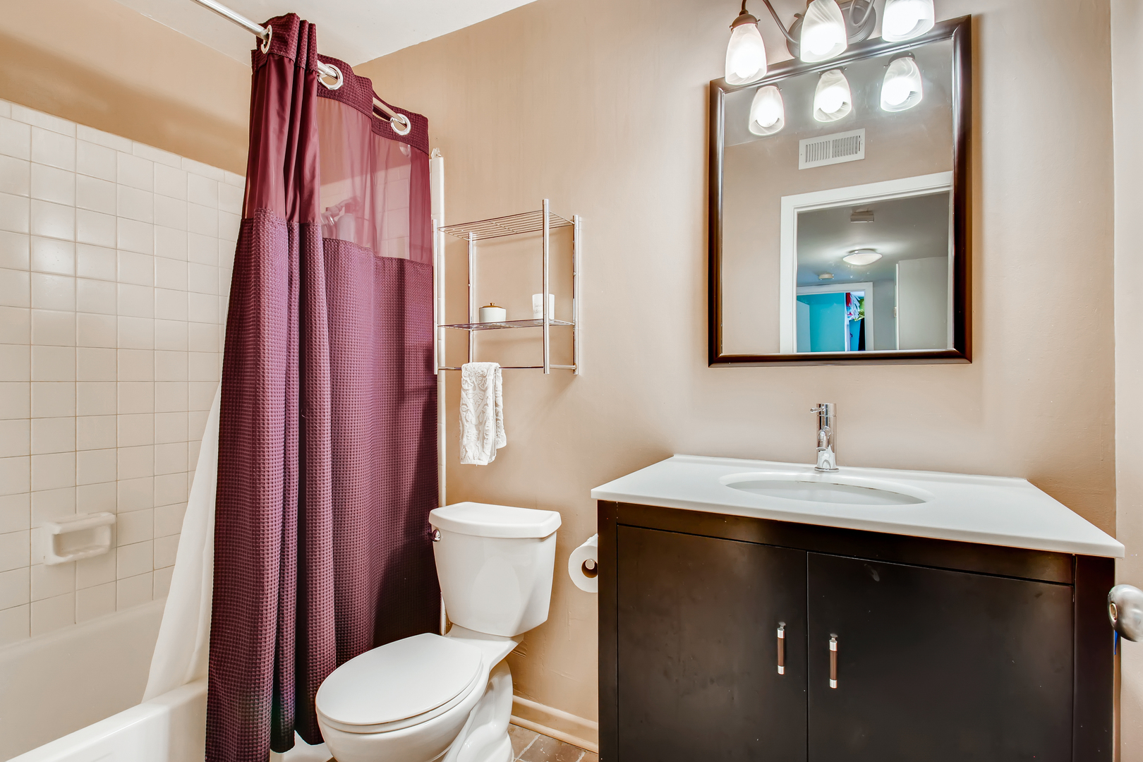 6177 Knoll Wood Road, Unit 201 Willowbrook, IL 60527 - Photo 10 of 11 a bathroom with a sink and a toilet