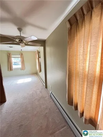 a view of a livingroom with a staircase