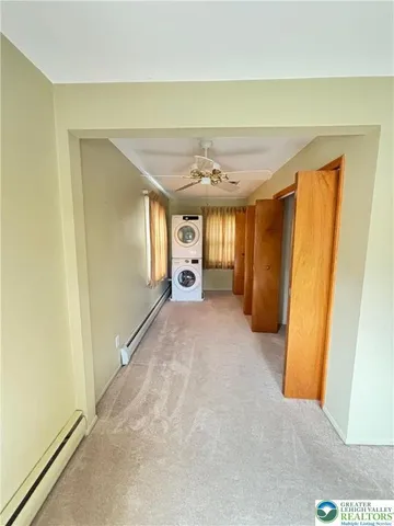 a view of hallway with livingroom