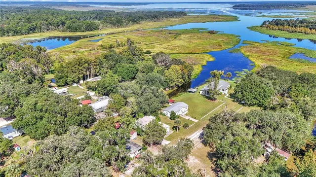 a view of a lake with an outdoor space