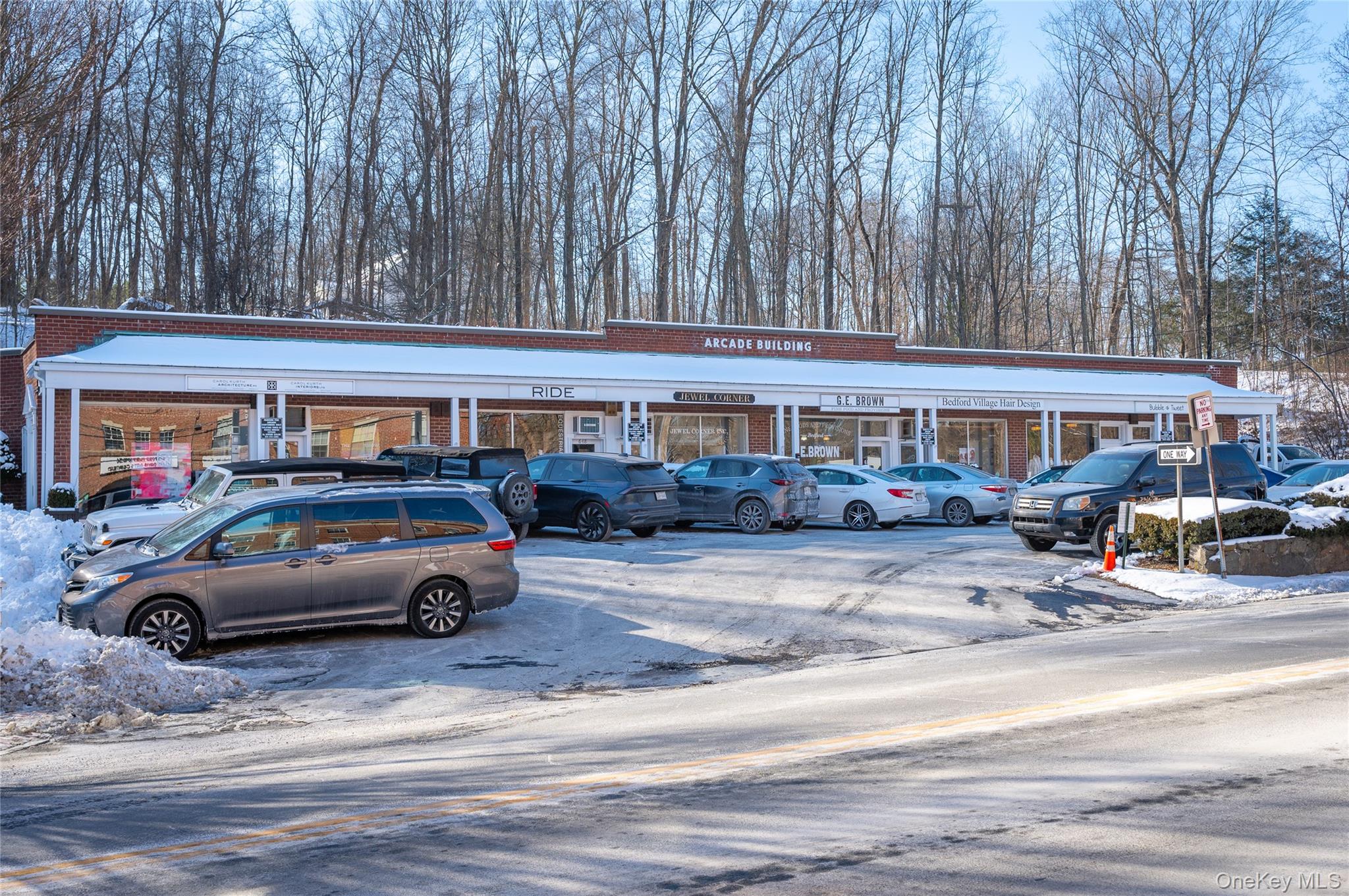 633 Old Post Road, Unit 34 Bedford, NY 10506 - Photo 11 of 14 a view of street with parked cars