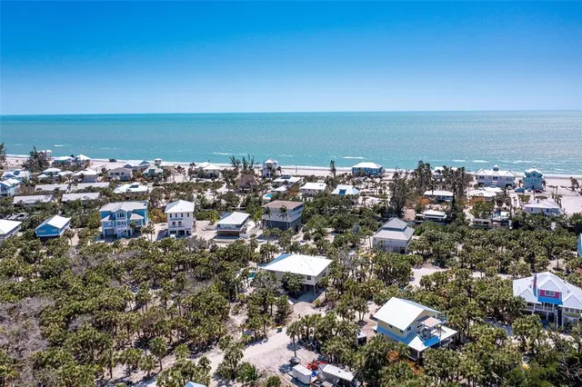 a car parked in front of a yard