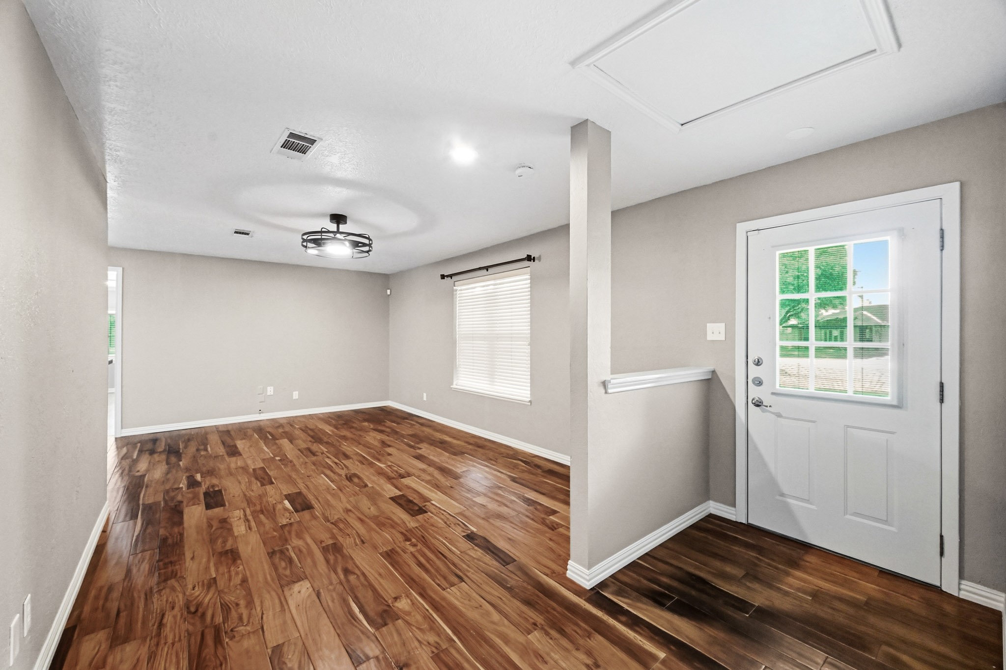3602 Sweet Gum Spring, TX 77388 - Photo 14 of 30 an empty room with wooden floor and windows