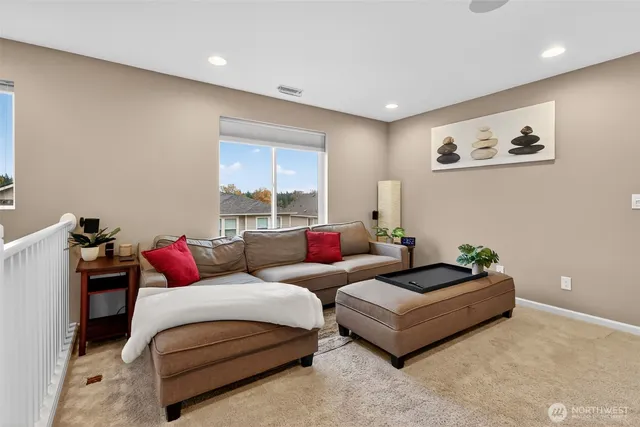 a living room with furniture and a couch