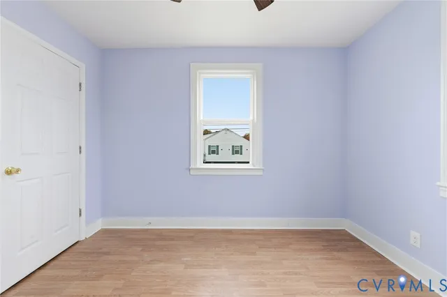 an empty room with window