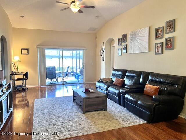 18430 Waydale Loop Hudson, FL 34667 - Photo 15 of 30 a living room with furniture and wooden floor