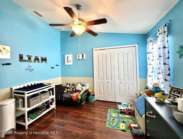 18430 Waydale Loop Hudson, FL 34667 - Photo 26 of 30 a bedroom with furniture and a window