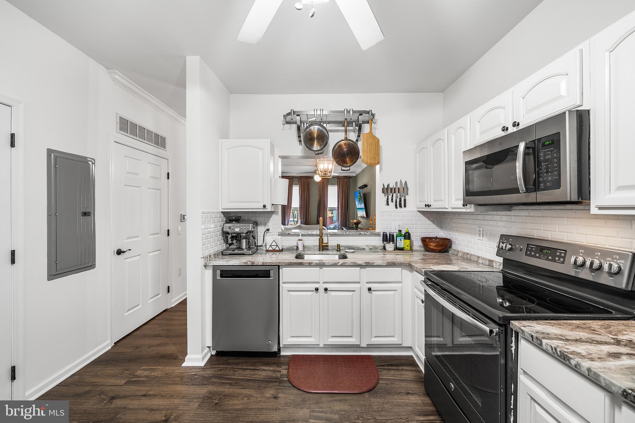 768 South 13th Street Philadelphia, PA 19147 - Photo 11 of 31 a kitchen with stainless steel appliances a sink stove and microwave