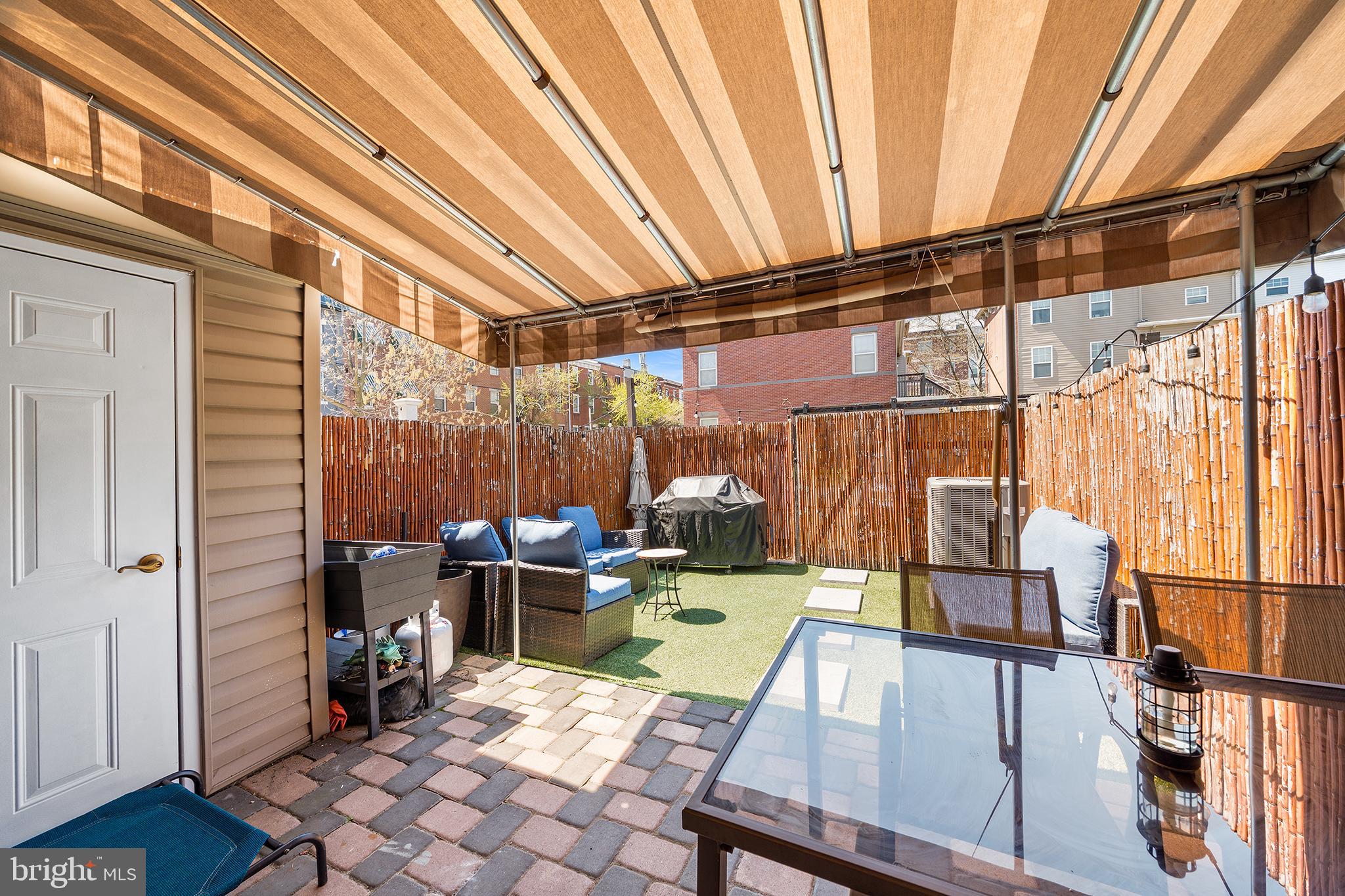 768 South 13th Street Philadelphia, PA 19147 - Photo 13 of 31 a view of a patio with a dining table and chairs