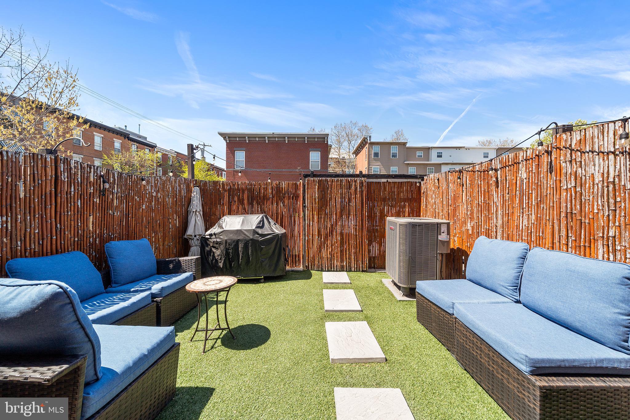 768 South 13th Street Philadelphia, PA 19147 - Photo 14 of 31 a view of a patio with couches chairs and a fire pit