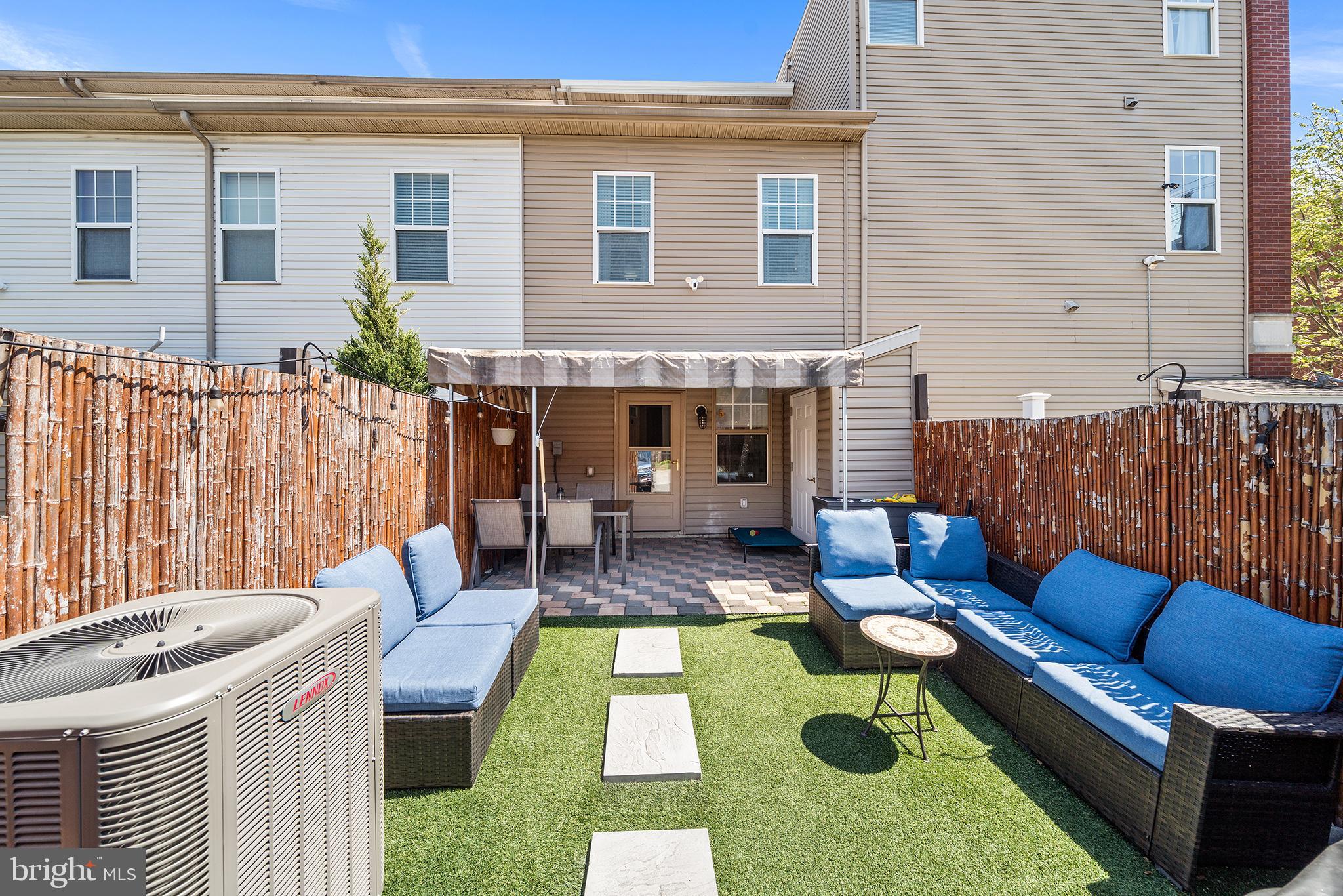768 South 13th Street Philadelphia, PA 19147 - Photo 15 of 31 a view of a patio with couches table and chairs with wooden fence