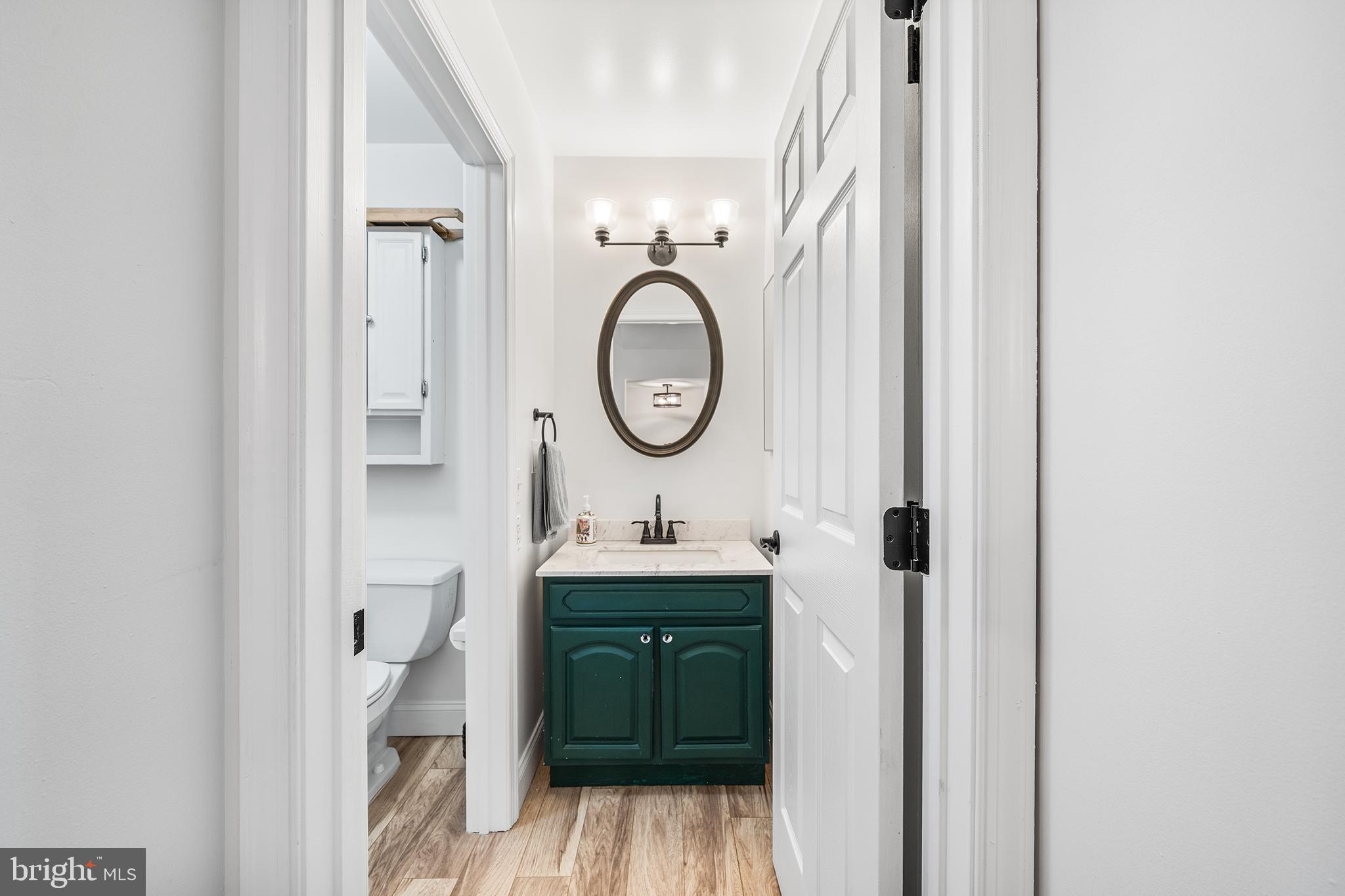 768 South 13th Street Philadelphia, PA 19147 - Photo 18 of 31 a bathroom with a sink and a mirror