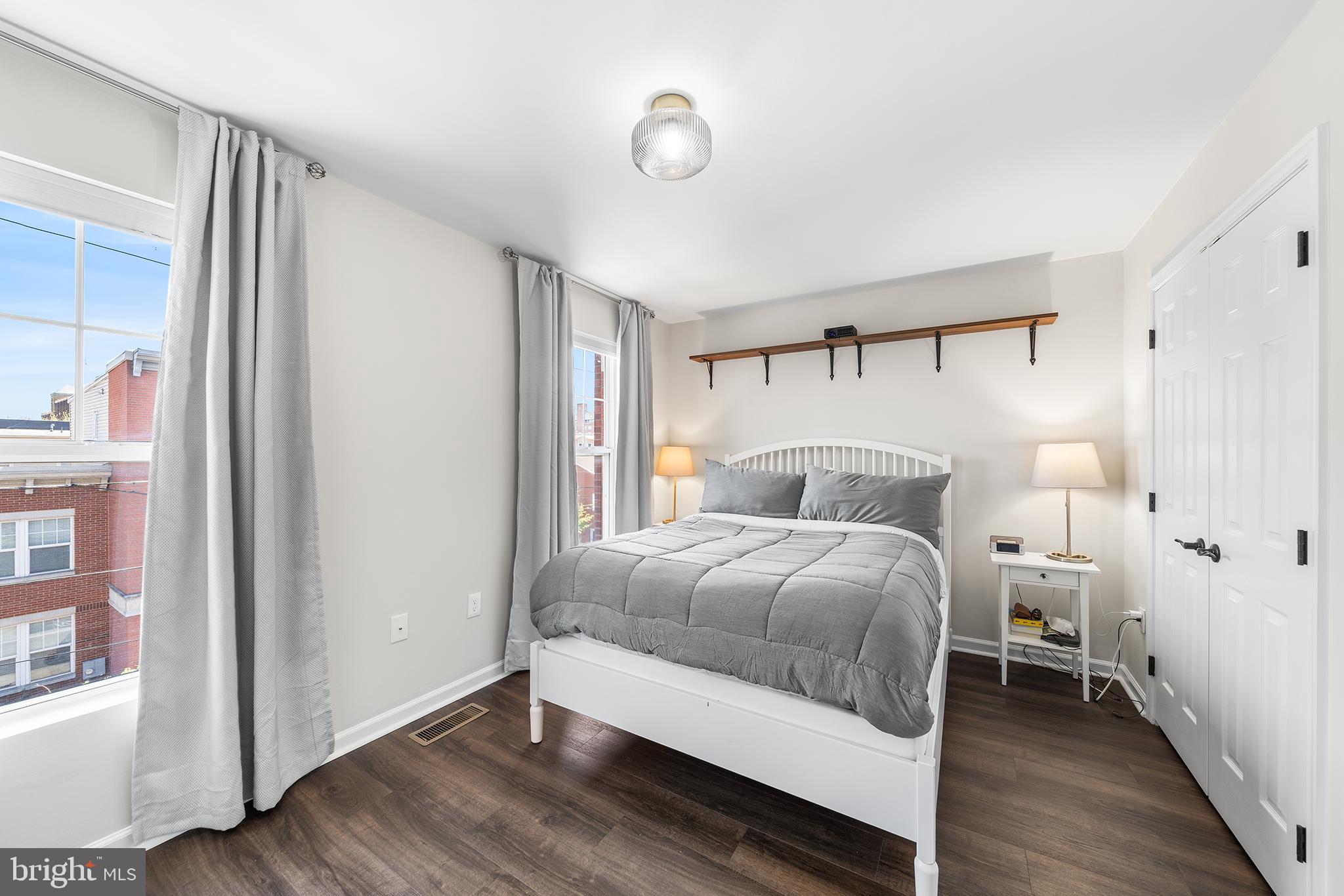 768 South 13th Street Philadelphia, PA 19147 - Photo 24 of 31 a bedroom with a bed and a window