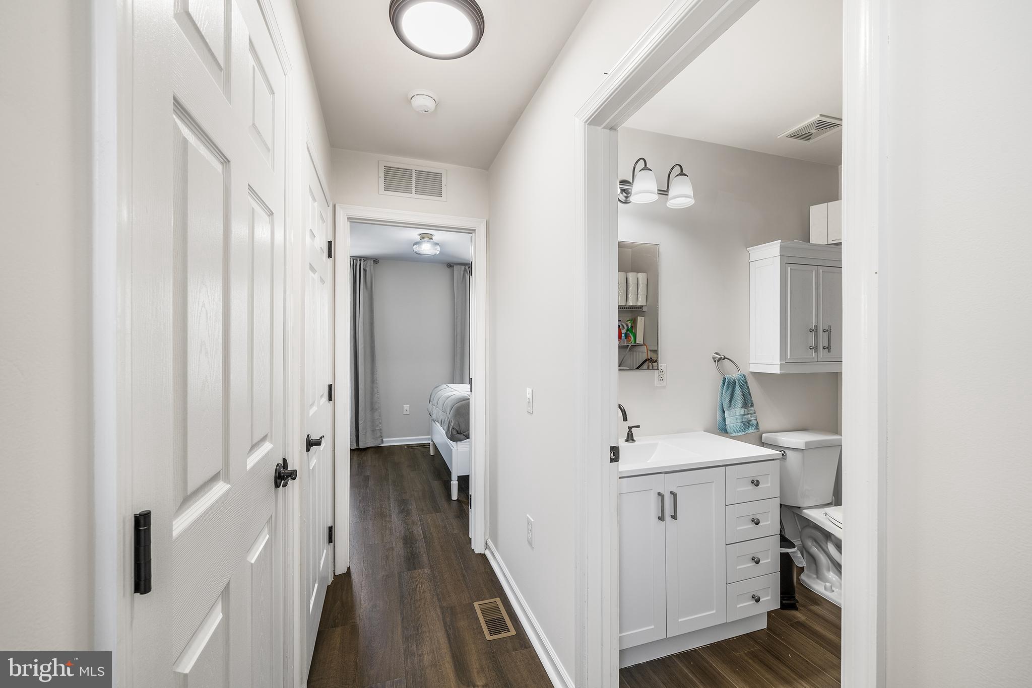768 South 13th Street Philadelphia, PA 19147 - Photo 25 of 31 a en suite bathroom with a double vanity sink and mirror