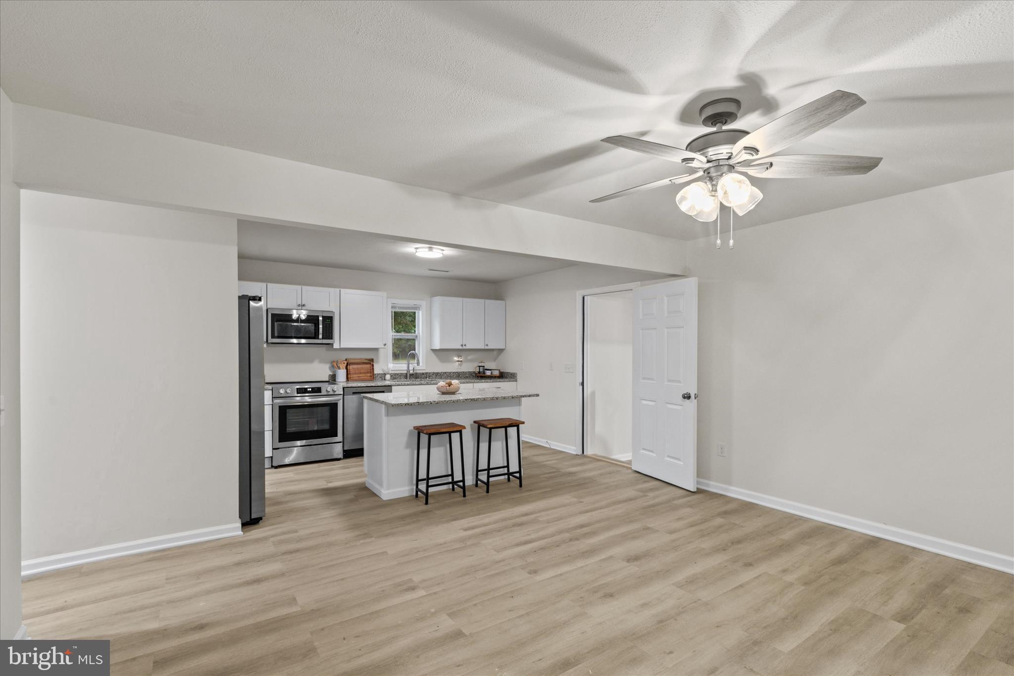 11477 Pine Pole Road Princess Anne, MD 21853 - Photo 6 of 33 Kitchen Opens to Living Room
