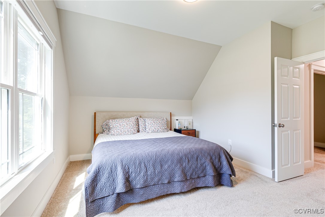 509 Danray Drive Richmond, VA 23227 - Photo 26 of 37 a bedroom with a bed and a window