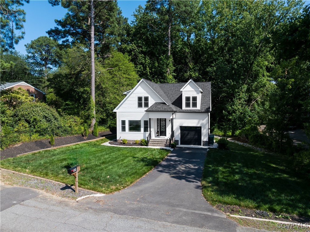 509 Danray Drive Richmond, VA 23227 - Photo 34 of 37 a front view of a house with a garden