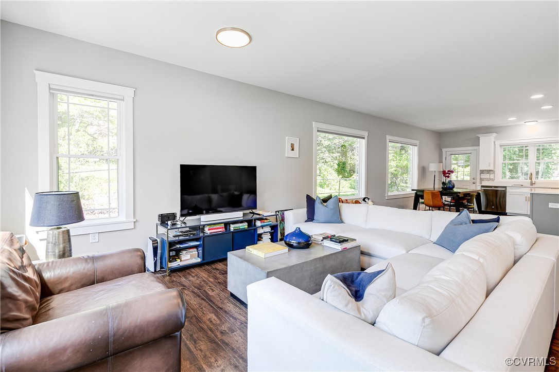 509 Danray Drive Richmond, VA 23227 - Photo 9 of 37 a living room with furniture and a flat screen tv