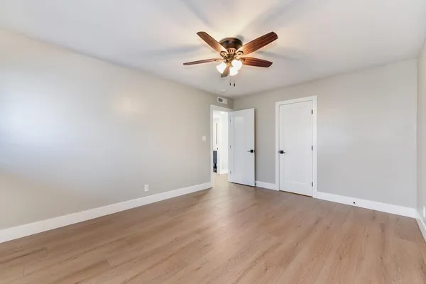 a bathroom with a bathtub and a sink