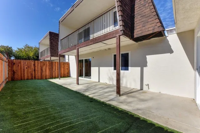 a view of a trees with a yard