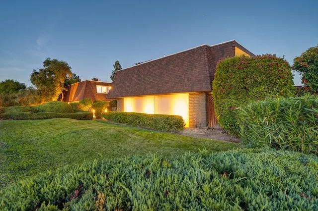 a picture of a bench in a white wall