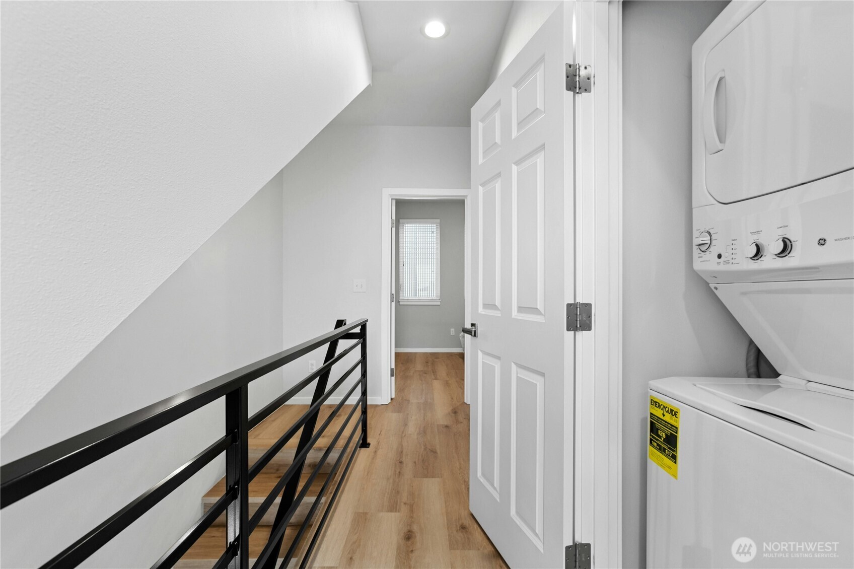 6641 Carleton Avenue South, Unit B Seattle, WA 98108 - Photo 20 of 33 a view of a hallway with wooden floor and staircase
