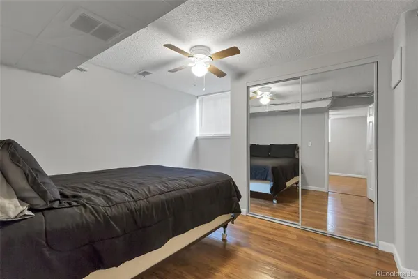 a bedroom with a bed and furniture