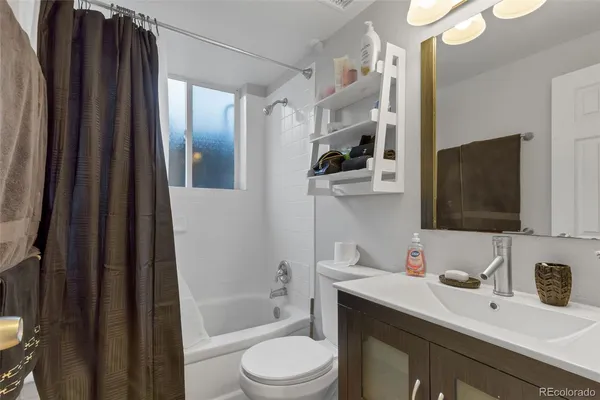 a view of storage and utility room with washer and dryer