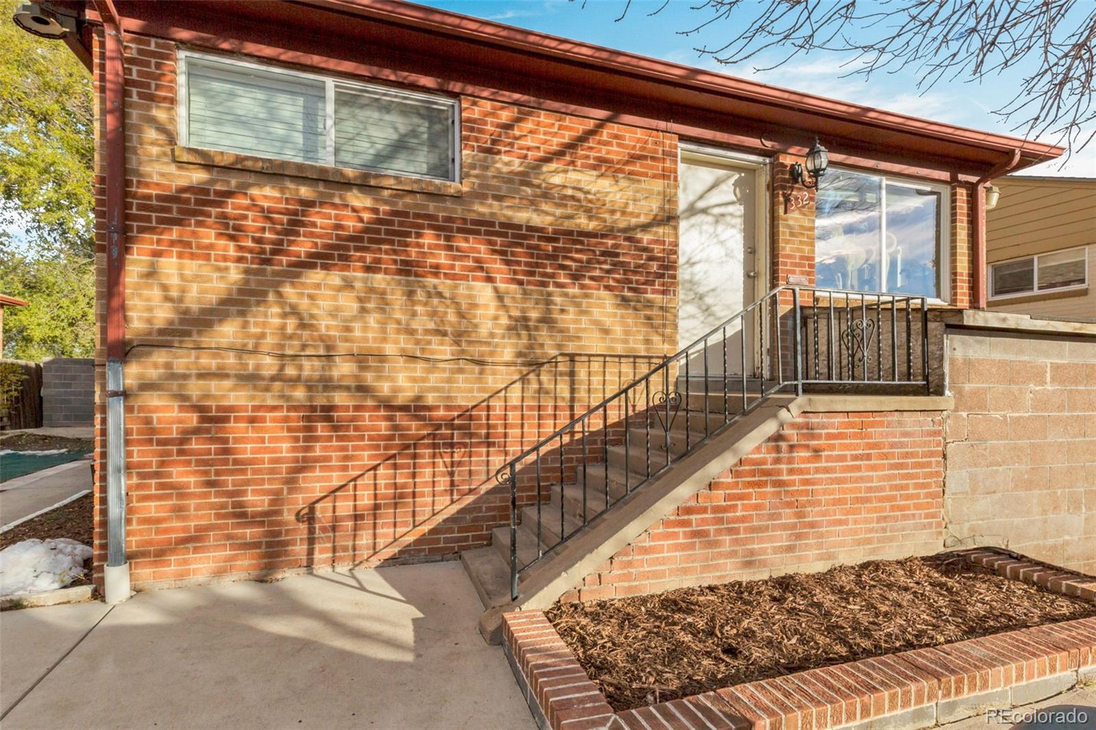 326 South Alcott Street Denver, CO 80219 - Photo 2 of 21 a view of wooden balcony