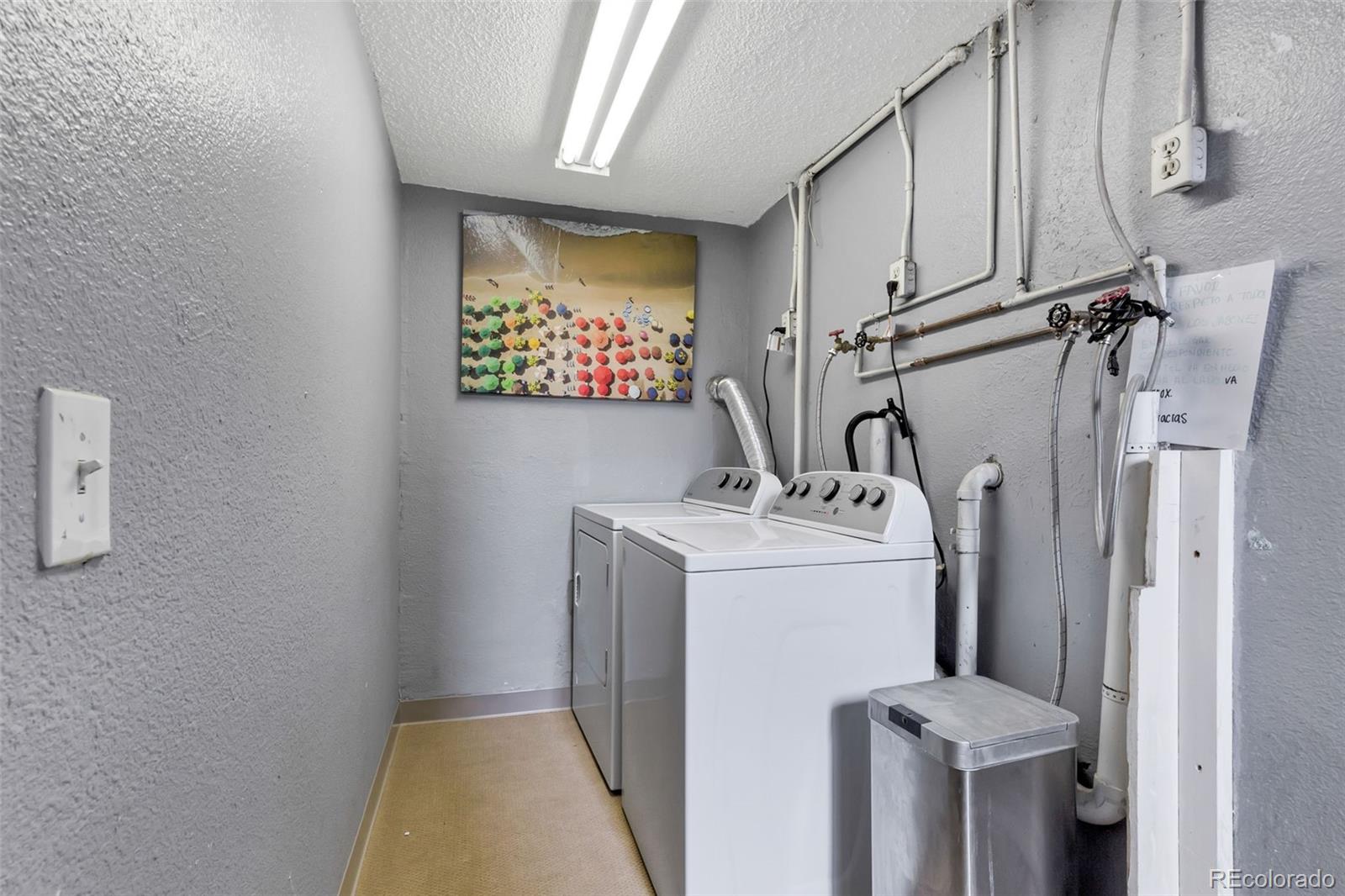 326 South Alcott Street Denver, CO 80219 - Photo 21 of 21 a view of storage and utility room with washer and dryer