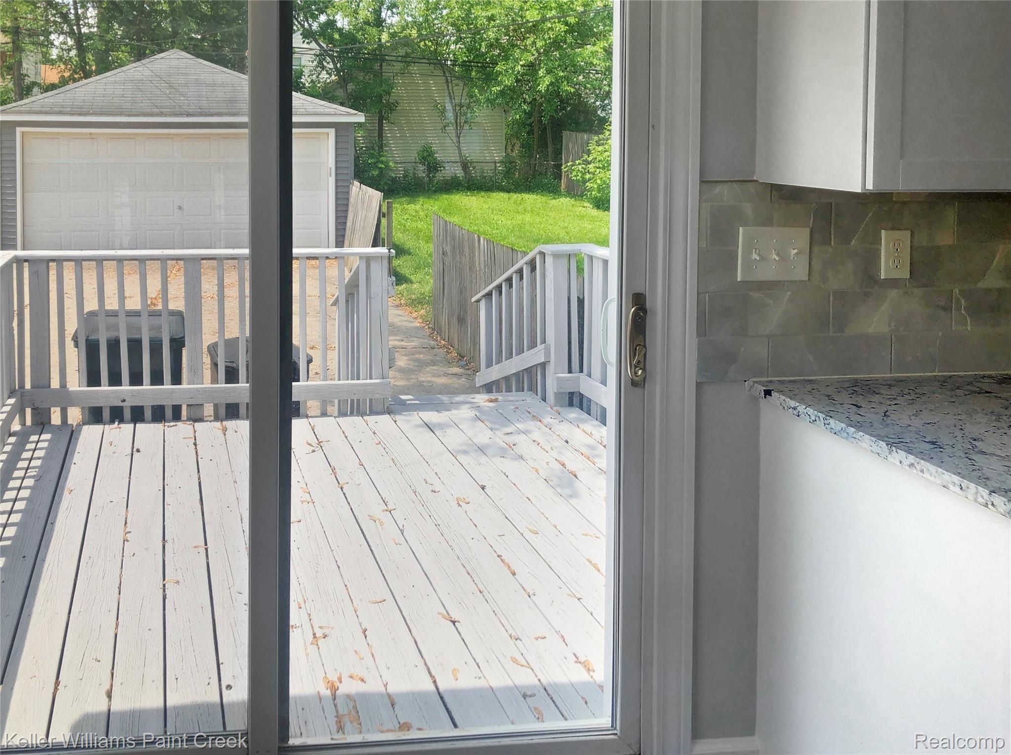 3259 Kenmore Road Berkley, MI 48072 - Photo 7 of 19 Kitchen Door Wall to Deck