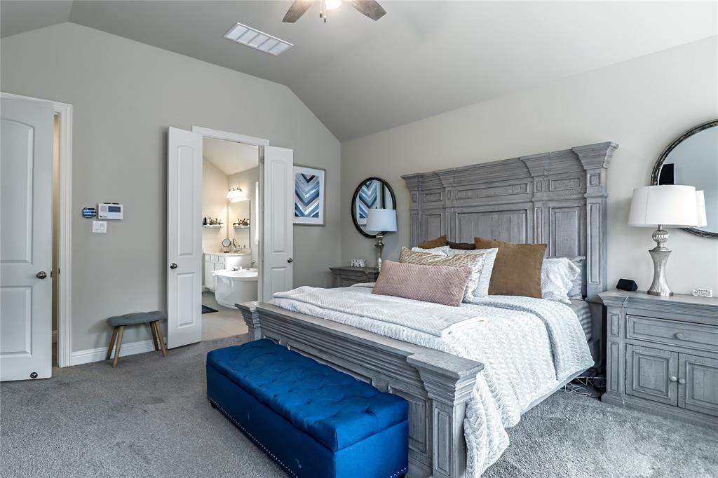 2400 Mill Pl Road Mansfield, TX 76063 - Photo 15 of 32 a bedroom with bed and a lamp on dresser