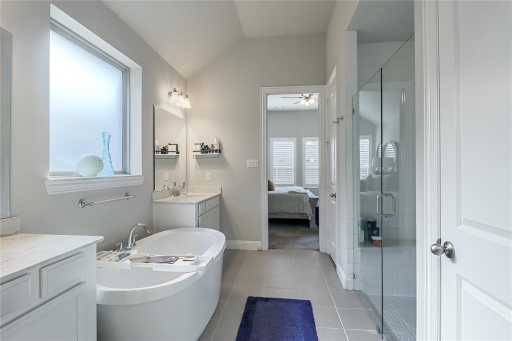 2400 Mill Pl Road Mansfield, TX 76063 - Photo 17 of 32 a bathroom with a toilet a sink and a mirror