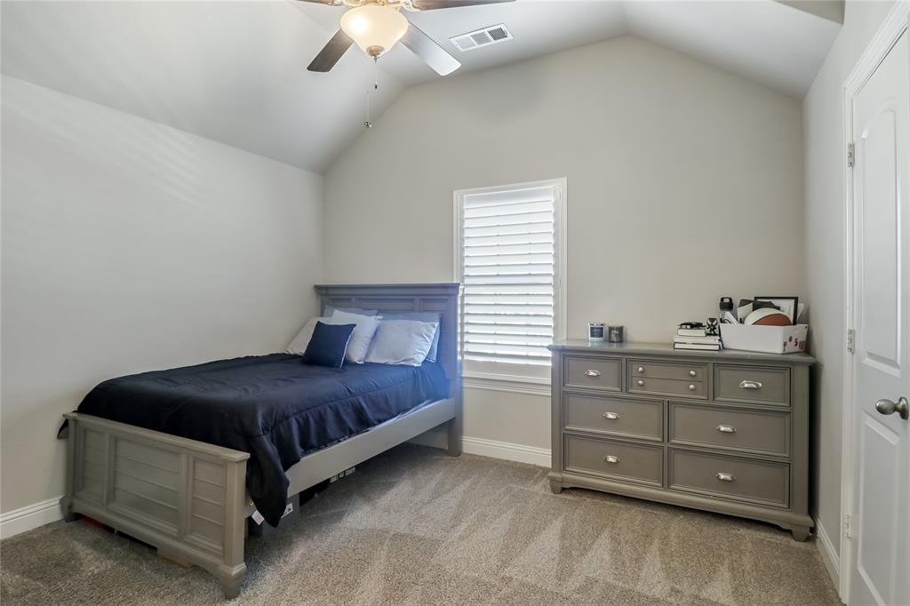 2400 Mill Pl Road Mansfield, TX 76063 - Photo 26 of 32 a bedroom with a bed and window