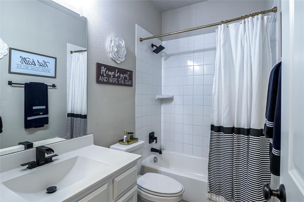 2400 Mill Pl Road Mansfield, TX 76063 - Photo 27 of 32 a bathroom with a sink a toilet and shower