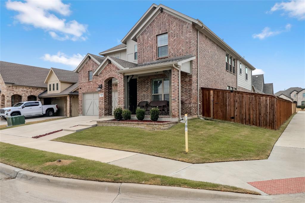 2400 Mill Pl Road Mansfield, TX 76063 - Photo 31 of 32 a view of a white house with a small yard and plants