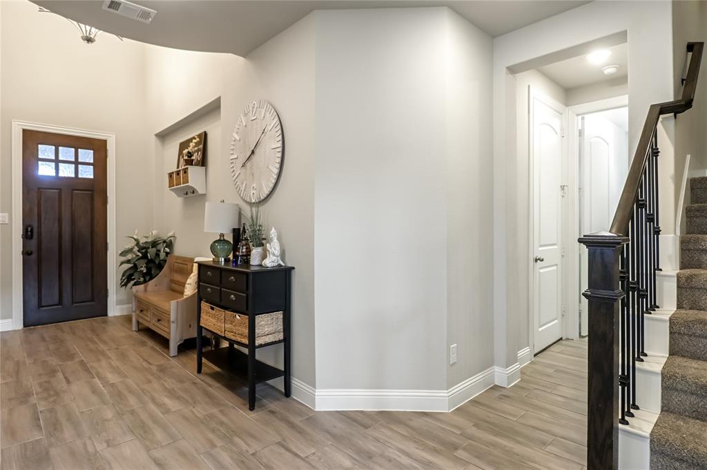 2400 Mill Pl Road Mansfield, TX 76063 - Photo 4 of 32 a view of a hallway with wooden floor and workspace