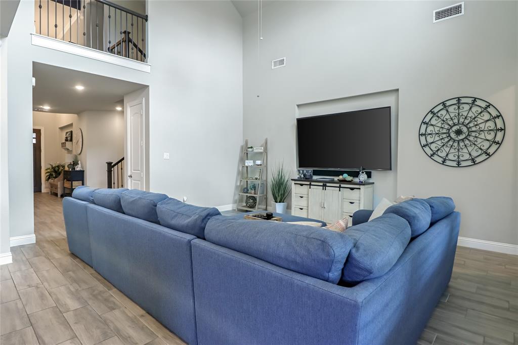 2400 Mill Pl Road Mansfield, TX 76063 - Photo 9 of 32 a living room with furniture and a flat screen tv